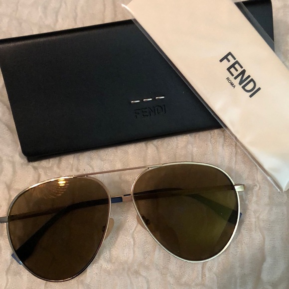 Fendi Accessories - Fendi sunglasses with blue on arms